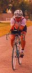 Frank riding his bike in Ironman distance triathlon - 2000